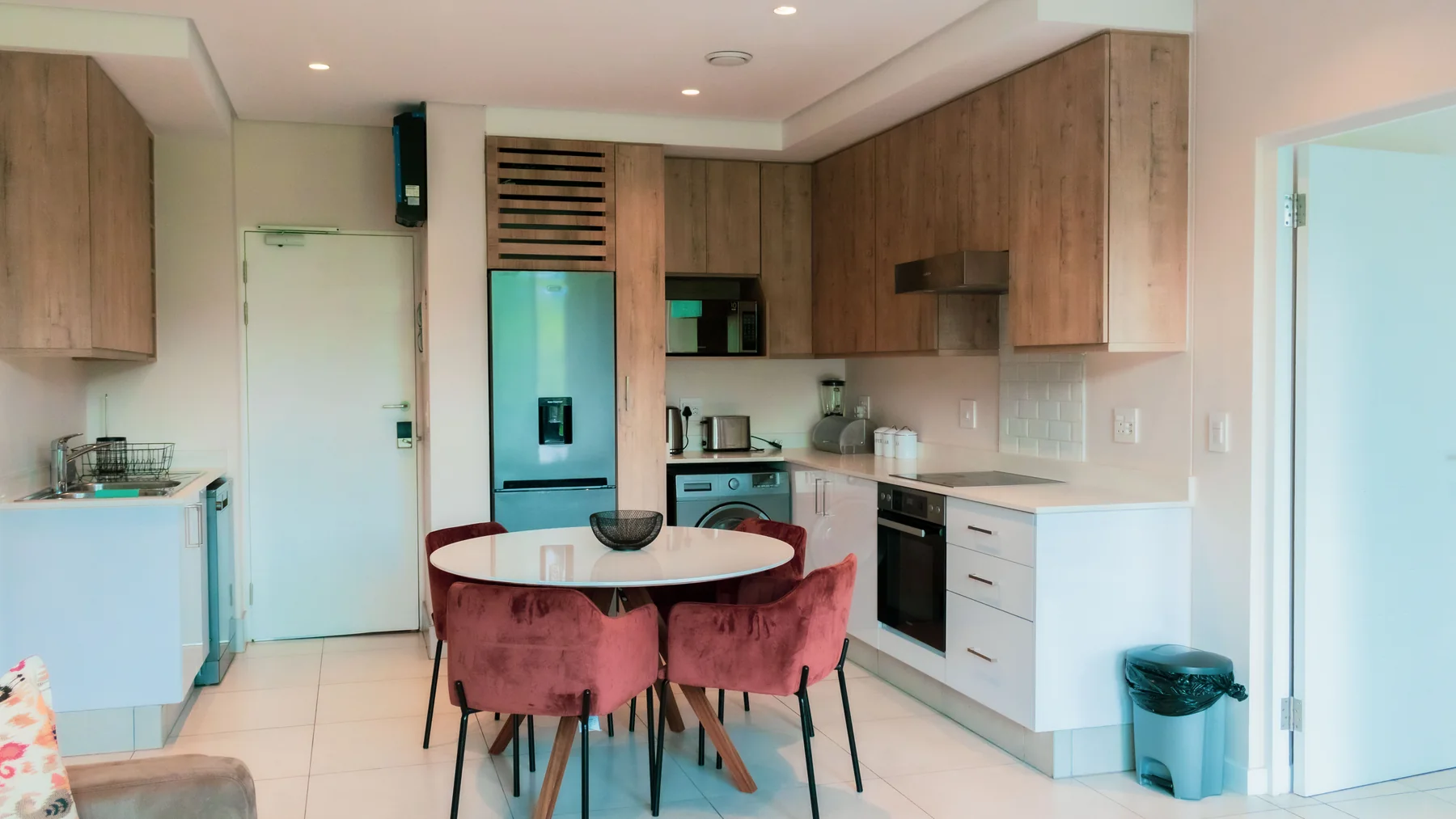 Fitted kitchen and dining area in Unit 113