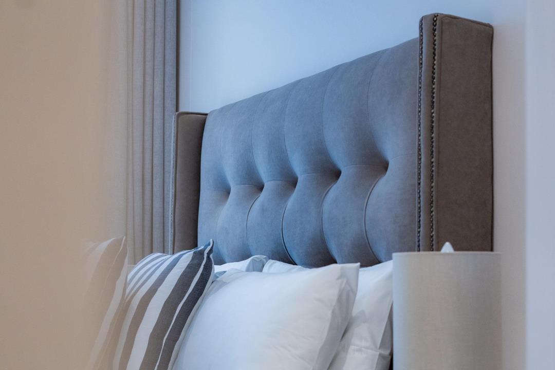 Furnished main bedroom at Unit 125
